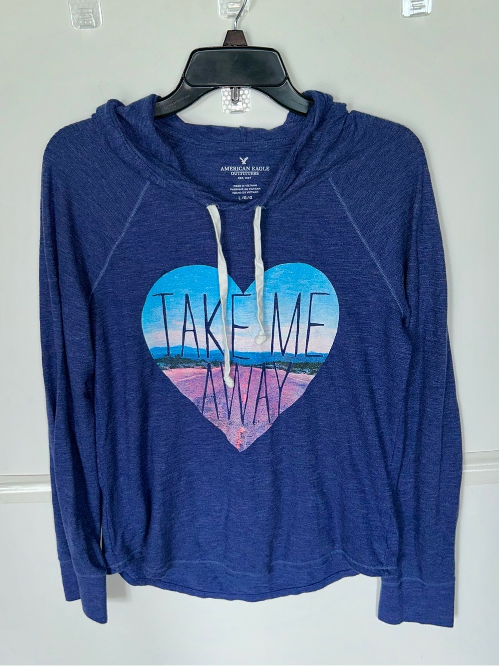 American Eagle woman’s LS blue hoodie with heart graphic. L